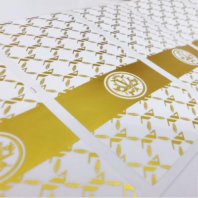 China Waterproof Custom Stickers Printing Labels Gold Foil Label Customize Adhesive Waterproof Vinyl Roll Label For Packaging for sale