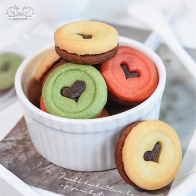 China Mini Galletas Heart Shape Melon Strawberry Fruit Milk Choco Cookies Snack Chocolate Cream Sandwich Biscuits en venta