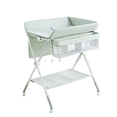 China Universal Size Sturdy Adjustable Diaper Changing Table Baby Nursery Storage Laundry Changing Rack for sale