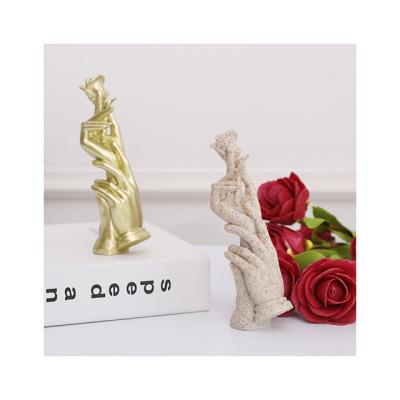 China Nordic Europe resin gold mini hand rose wedding gift couples wedding decoration home decoration for sale