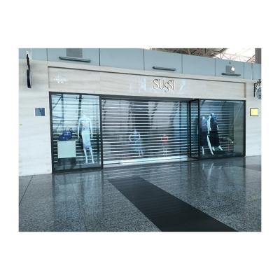 China Modern Electric Automatic Interior Roller Shutters Polycarbonate Clear Shutter Doors for sale