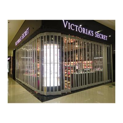 China Custom Clear Plastic Sliding Folding Shutters Crystal Polycarbonate Doors Commercial Anti-theft Slide Shutter Store for sale