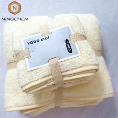 China 2018 Hot Sale China Compressed Fleece Coral Towel Set Cloth Coral Face Microfiber Fleece Cleaning Baby Bathing Towel Set for sale