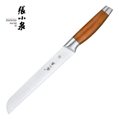 China Sustainable OEM Cake Serving Wire Drawing Knife Wood Grain Cavity Handle 8 Inch Bread Knife for sale