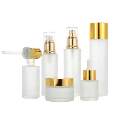 China High Quality Luxury Cosmetics Glass Bottle Set Jar Cosmetic Cream Lotion Bottle Set Cosmetic Packaging Container for sale