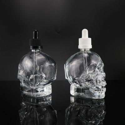 China High Quality Shaped Glass Bottle Skull Dropper Bottle 30ml 60ml Skull Shape Dropper Bottle For Serum for sale