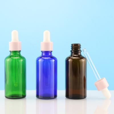 China Cosmetic in stock 10ml 20ml 30ml 50ml 100ml blue glass dropper bottle for essential oil for sale