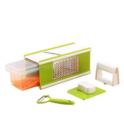 China Amazon Sustainable Hot Sale 5 in 1 Manual Stainless Steel Multifunctional Vegetable Food Cleaver / Grater / Cutter for sale