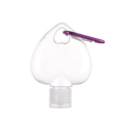 China Hot Sale 50ml PETG Heart Shape Hand Sanitizer Hook Cosmetic Bottle With Flip Top Hand Gel Bottle PETG Key Chain Bottle Stock zu verkaufen