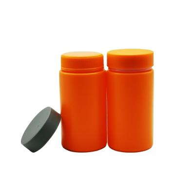 China Empty Drink 175cc 200cc Custom Vitamin Capsule Tablet Orange Health Care Supplement PE Bottle Plastic Pill Jar With Double Lid Caps for sale