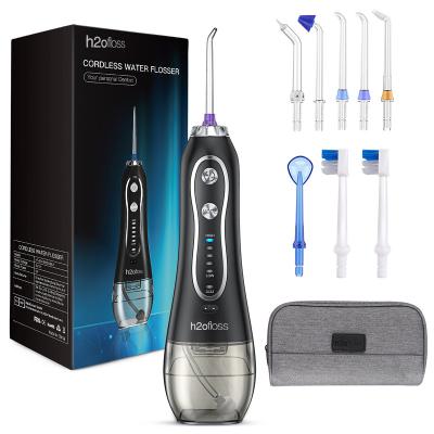 China Outdoor Portable Hand Control Oral Dental Irrigator Water Flosser with DC5V 1A for sale