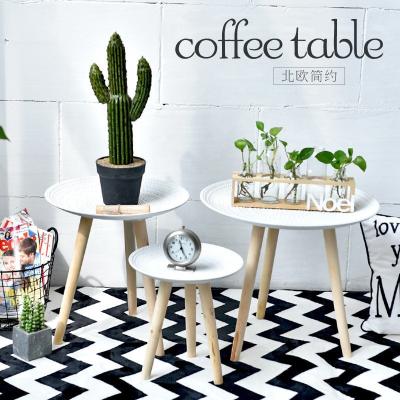 China Modern simple wooden creative living room home decoration small round table small coffee table Amazon small coffee table for sale