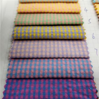 China Hot Sale Anti-Static Fabric Check Red White Check Suiting Cloth Men Check Shirt And Skirt for sale