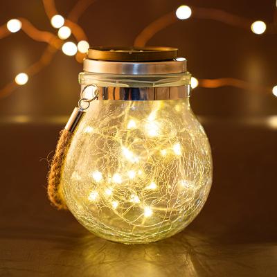 China Beautiful Warm White Solar Glass Hanging Cracked Garden Light Solar Glass Decorative Festival Light Tank Lights for sale