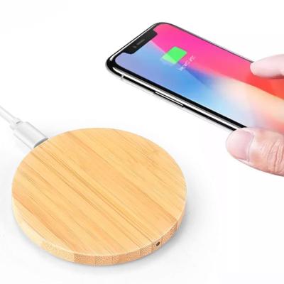 China Wooden Cell Phone Wireless Charger Qi Fast Charging Universal Convenient Power Bank For Android And IOS for sale