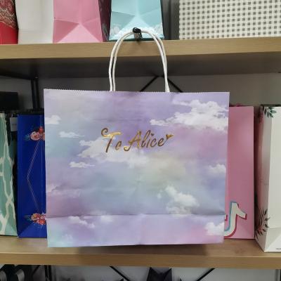 China Custom Full Pattern Recyclable Kraft Paper Luxury Printed Pink Kraft Paper Packaging Fashion Shopping Gift Bag For Fashion Store for sale