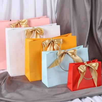 China Recyclable Custom Luxury Clothing Retail Bag Packing Pink Gift Bag Papel Bolsas Shopping Packaging Paper Bags With Handles For Clothes for sale