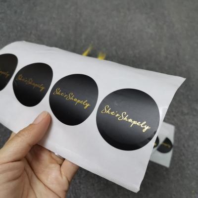 China Clear Waterproof Custom Gold Foil Self Adhesive Private Logo Printing Roll Transparent Labels Sticker for sale