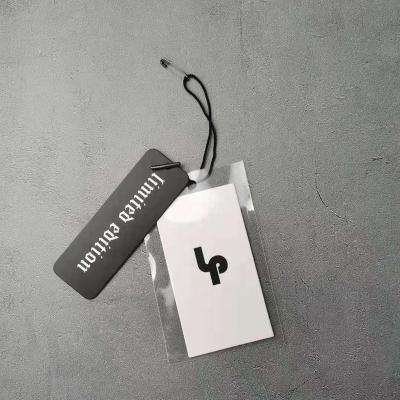 China New Viable Design Custom Luxury Hang Tag Clothes Hang Tag Paper Hang Tag With OPP Pouch For Apparel Garment for sale