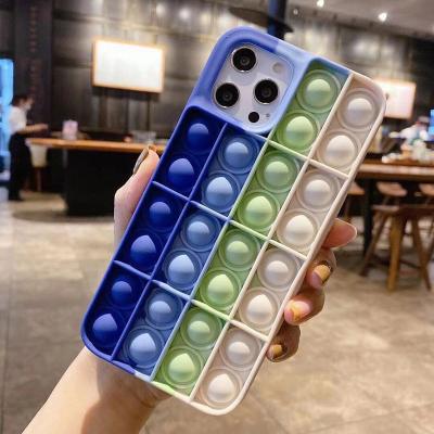 China Shockproof Noise Phone Case For iPhone 12 Case Silicone Shockproof 2 In 1 Moving Person Toy Phone Case Push Bubble Back Cover For iPhone 12 for sale