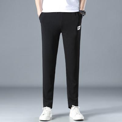 China New Fashion Summer Young Men's Trend Men's Breathable Spring And Ant Wrinkle Leisure Pants QUICK DRY Elastic Long Pants for sale