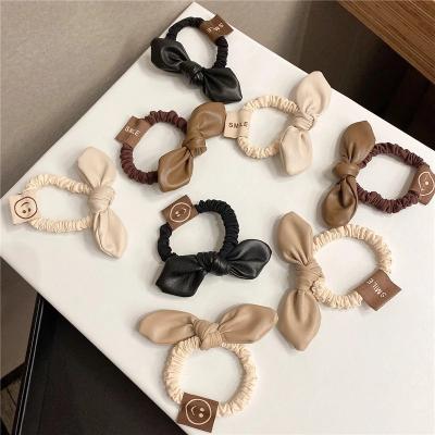 China European and American Single Knot Leather Main Rope Bow Style Four Seasons Ponytail Elastic Band Female Hair Ropes for sale