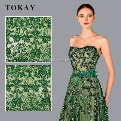 China Sustainable Green High End Dresses Lace Fabric Beaded Tulle Lace Fabric for sale