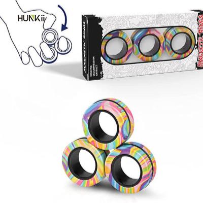 China Plastic Newest Fingers Magnet Rings Stress Relief Magical Toys For Training Relieves Autism Magnetic Ring Fidget Spinner Toys for sale