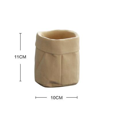 China Contemporary Wholesale Simple Nordic Paper Bag Cement Flower Pot for sale