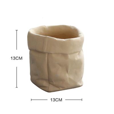 China New Contemporary Simple Nordic Paper Bag Vase Cement Garden Pot for sale