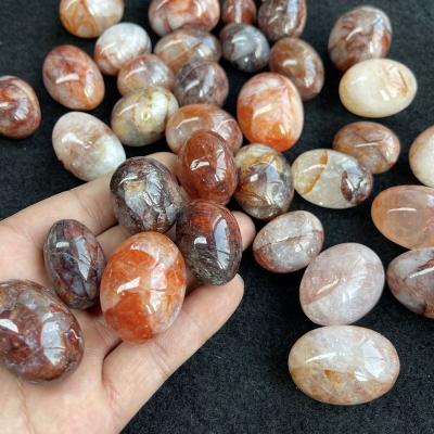 China Europe Wholesale Polished Natural Quartz Red Fire Crystal Tumbled Stones for sale