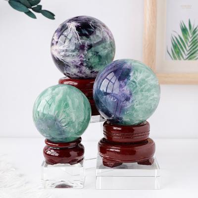 China Europe Natural Crystal Spiritual Healing Stones Rainbow Fluorite Sphere For Home Decoration for sale