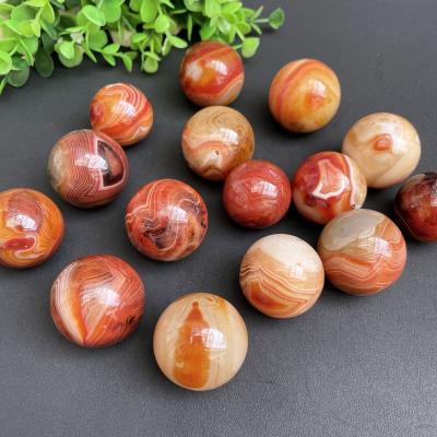 China Europe Polished Healing Stones Natural Sardonyx Agate Sphere for sale