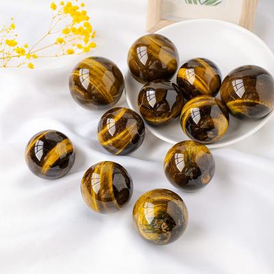 China Europe Wholesale Natural Quartz Crystal Gemstone Ball Yellow Tiger Eye Sphere for Home Decor for sale