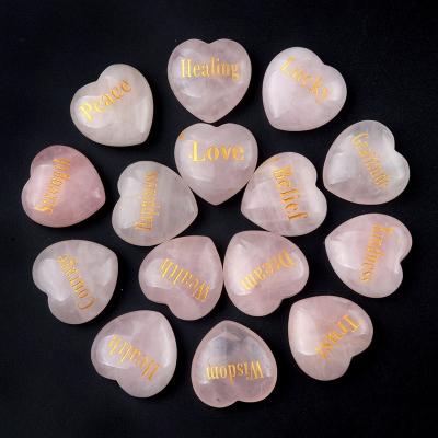 China Europe Wholesale Carved Love Crystal Crafts Natural Pink Rose Quartz Heart Shaped Stone With Love Runes for sale