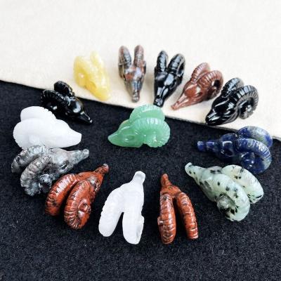 China Europe Customized Semi-precious Stone Crafts Unique Shape Quartz Skulls 3CM Crystal Sheep Horn Skulls for sale