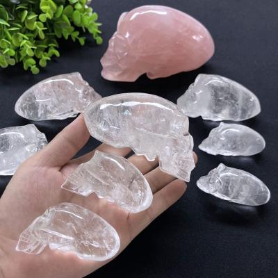 China Europe Customized Semi-precious Stone Crafts Hand Carved Natural Quartz Crystal Alien Skulls Clear Quartz Long Head Skulls for sale