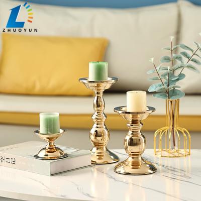 China Zhuoyun Wedding Centerpiece Table Decoration Gold Handmade Iron Metal Modern Candle Holder for sale