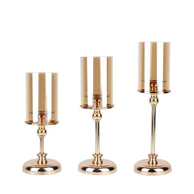 China Home decoration plating gold candle holder table decorative centerpiece modern candlestick for decoration for sale