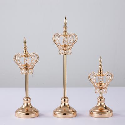 China Home decoration plating gold crown candle holder table decorative centerpiece modern candlestick for decoration for sale