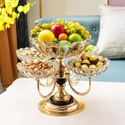 China Modern restaurant hotel home decoration round 2 and 3 layer decorative glass fruit tray with copper holder crystal candy dish 360 degree fruit rotating dish for sale