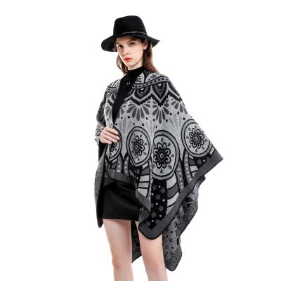 China Autumn Acrylic Female Geometric Winter Cardigan Street Flower Fashion Coat Shawl Long Cape for sale