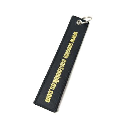 China All Wholesale Cheap Custom Aircraft Logo Embroidery Brand Name Fabric Key Chain For Before Flight for sale