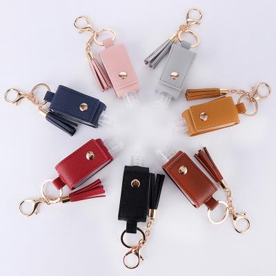 China New Portable USA PU Hand Sanitizer Bottle Tassel Key Chain for sale