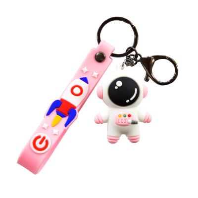 China Custom Rubber Soft World Cosmonaut Cup Pvc Key Chain Car 3D PVC Astronaut Keychain for sale