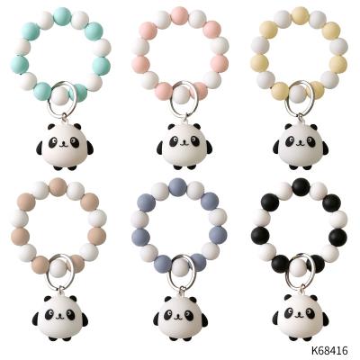 China 2022 New USA Cartoon Cute Panda Bracelet Key Chain PVC Silicone Beaded Bracelet Bear Doll Key Chain for sale