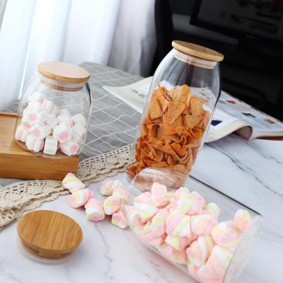 China Freshness Keeping Hot Sale Storage Candy Food Borosilicate Glass Jar With Bamboo Lids Dry Food Keeping Glass Container For Milk Powder Four Bin for sale