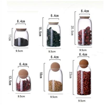 China Large Nordic Style Glass Freshness Storage Home Organization Office Storage Jars Dried Fruit Hide Acacia Jar Canister Set Kitchen Spice Jar for sale