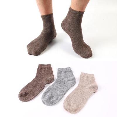 China Solid Color Sustainable Unisex Thick Winter Knitted Cashmere Warm Woolen Snowfall Socks for sale