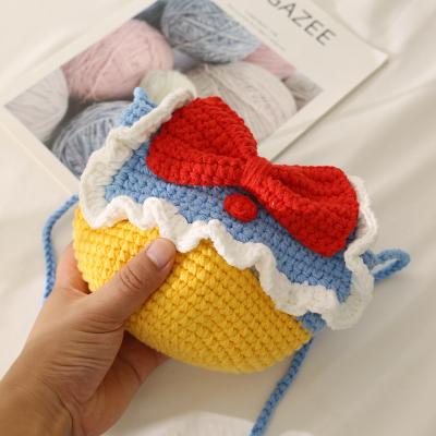 China Fashoion cartoon kids lady handmade sweet cross - body shoulder knitted knitted bow knot shell coin purse sling pocket cute crotchetting bag for sale